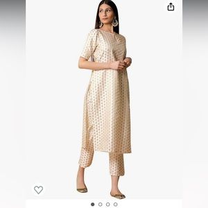 White and gold woman’s kurti